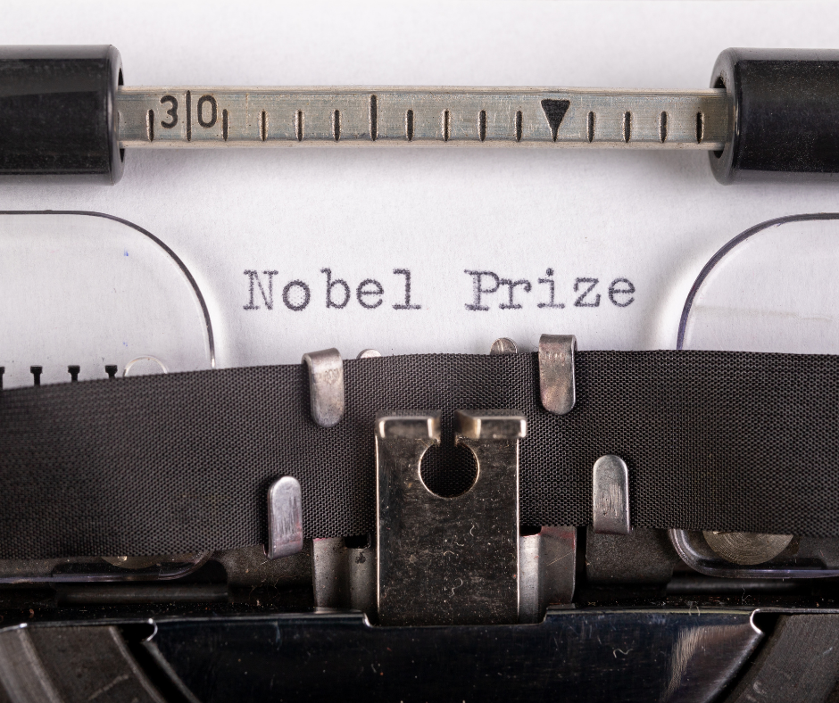 Old fashioned typewriter with Nobel Prize printed on the paper in the typewriter. 